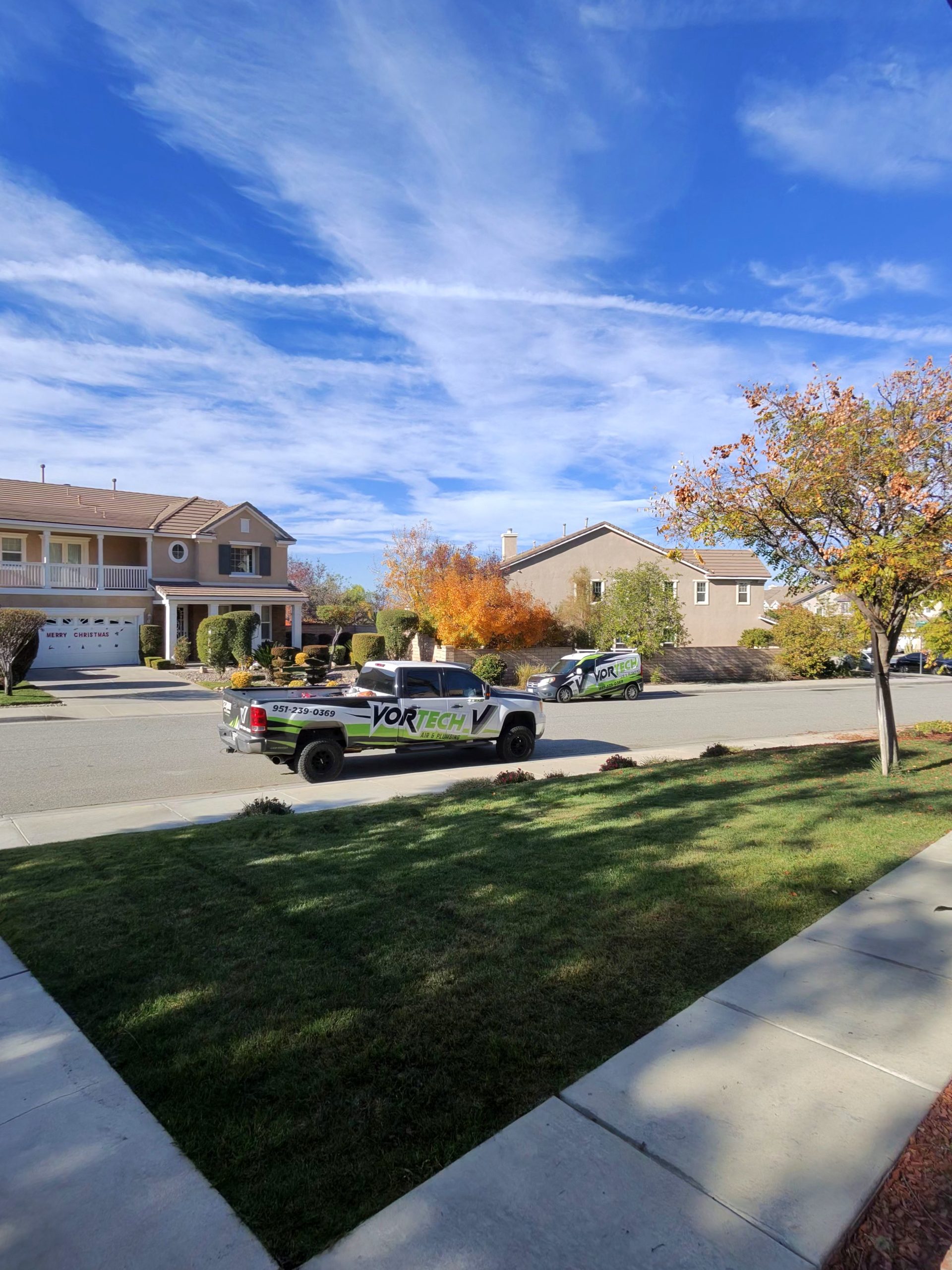 Licensed HVAC technician performing air conditioning service in Menifee CA